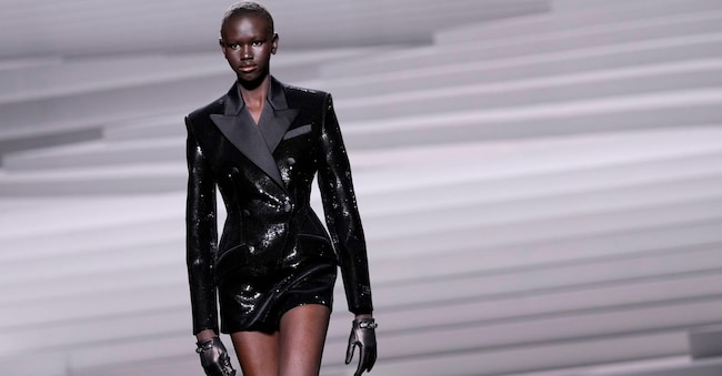 A model wears a creation as part of the Versace women's Fall-Winter 2024-25 collection presented in Milan, Italy, Friday, Feb. 23, 2024. (AP Photo/Antonio Calanni)