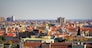 Aerial panoramic view of Milan on sunny day in Italy .