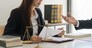 Legal and justice concept, Male lawyer explains contract about regulation to consultant in law firm.