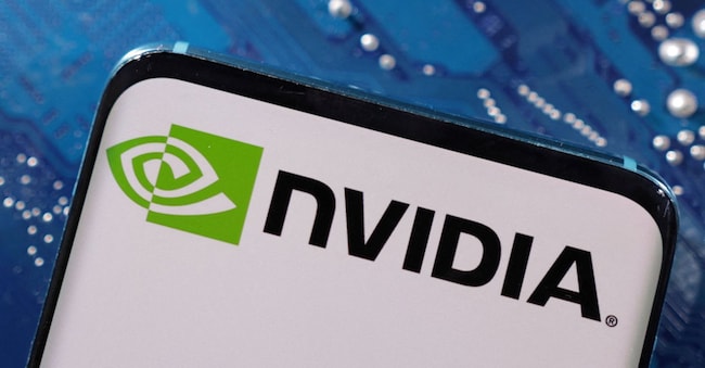 FILE PHOTO: A smartphone with a displayed NVIDIA logo is placed on a computer motherboard in this illustration taken March 6, 2023. REUTERS/Dado Ruvic/Illustration/File Photo