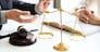 business people and lawyers discussing contract papers sitting at the table. Concepts of law, advice, legal services, legal and judgment concept