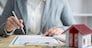 Insurance concept the client reading and revising the insurance contract carefully.