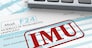 close up view of F24 form for italian taxes,the word imu and an electronic calculator (3d render)