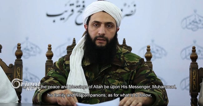 Immagine presa da un video trasmesso nel 2016 di Abu Mohamad al-Jolani, leader dei ribelli che hanno deposto Bashar al-Assad. (Photo by HO / Orient News / AFP)