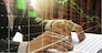 Double exposure of businessman using the laptop with stock market or financial graph for financial investment concept, Business investment and trading concept.