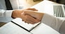 business negotiation in meeting hands shaking successful agreement