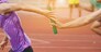 Professional Athlete passing a baton to the partner against race on racetrack.selective focus.