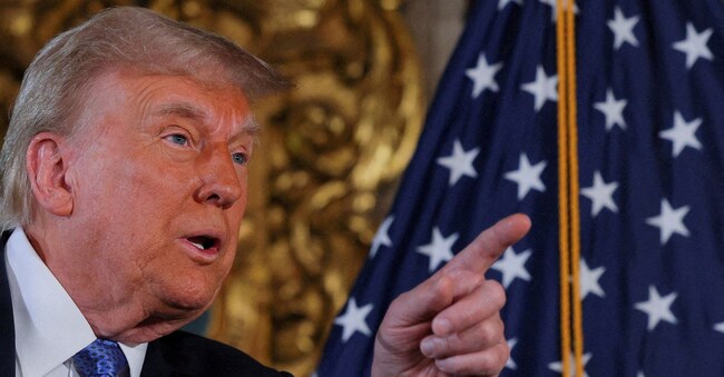 FILE PHOTO: U.S. President-elect Donald Trump delivers remarks at Mar-a-Lago in Palm Beach, Florida, U.S., December 16, 2024. REUTERS/Brian Snyder/File Photo