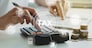 women using calculator calculated individual income tax for pay taxes annual.Financial research,government taxes and calculation tax return concept. Tax and Vat concept.