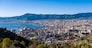 PALERMO, SICILY, ITALY - 2022/04/08: Aerial view of town from Mt. Pellegrino with many houses and the Port of Palermo, Porto di Palermo. (Photo by Frank Bienewald/LightRocket via Getty Images)