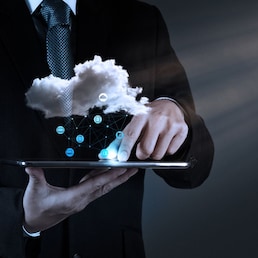 Businessman hand working with a Cloud Computing diagram on the new computer interface as concept