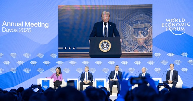 US President Donald J. Trump is shown on screens as he addresses via remote connection a plenary session in the Congress Hall, during the 55th annual meeting of the World Economic Forum (WEF), in Davos, Switzerland, Thursday, Jan. 23, 2025. (Michael Buholzer/Keystone via AP)

Associated Press/LaPresse