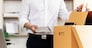 Resignation Businessmen are gradually packing personal boxes and resignation letters. Concept of unemployment, resignation, big resignation