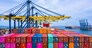 Container ship loading and unloading in deep sea port, Aerial top view of business logistic import and  export freight  transportation by container ship in open sea.