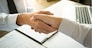 business negotiation in meeting hands shaking successful agreement