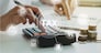 women using calculator calculated individual income tax for pay taxes annual.Financial research,government taxes and calculation tax return concept. Tax and Vat concept.