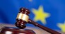 Judge hammer with European flag background