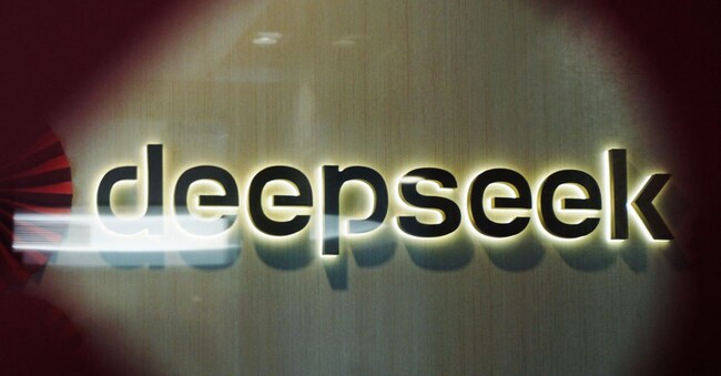 TOPSHOT - The DeepSeek logo is seen at the offices of Chinese AI startup DeepSeek in Hangzhou, in China’s eastern Zhejiang province on February 5, 2025. (Photo by AFP) / China OUT