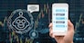 Female hand holding mobile phone showing the chatbot message While being decided place the order over the Stock market chart with cityscape, AI technology concept