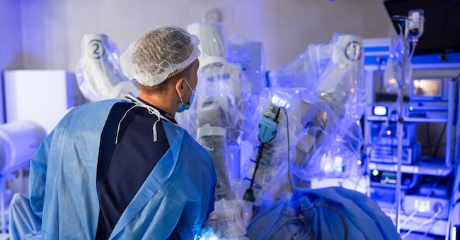 Emergency operating hospital process. Surgery modern room with robot technology.