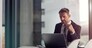 Laptop, thinking and boardroom with a businessman at work on research for future company growth. Computer, idea and innovation with a male employee or manager in his office with review his strategy.