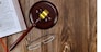 10 OCOBER 2021 New York Time USA: Christian God justice of judge gavel on Holy Bible world book on wooden table