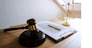 Close up object  law concept. Judge gavel with justice lawyers and documents working on table.