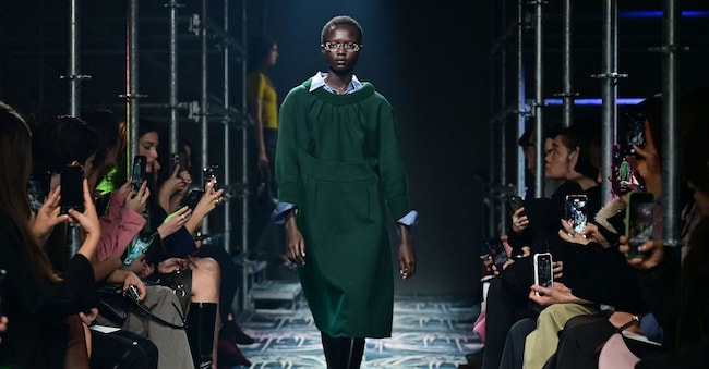 A model presents a creation by Prada for the Womenswear Ready-to-wear Fall-Winter 2025/2026 collection as part of the Milan Fashion Week, at Fondazione Prada, in Milan on February 27, 2025. (Photo by Piero CRUCIATTI / AFP)