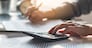 Tax deduction planning concept. Businessman calculating business balance prepare tax reduction.