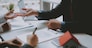 couple buying renting house signing mortgage contract agreement with realtor real estate agent. architect designer closing dealing with customer