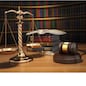 Justice concept. Gavel,  golden scales and books in the library with dof effect. 3d