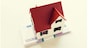 building, mortgage, investment, real estate and property concept - close up of home or house model and money