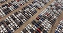 Aerial view of huge storage parking with new cars