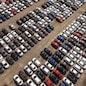 Aerial view of huge storage parking with new cars
