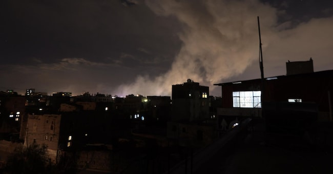 Smoke rises from a position following airstrikes in Sana'a, Yemen, 15 March 2025. Three airstrikes targeted a neighborhood in Sana'a, causing powerful explosions, the Houthis-run Al-Masirah TV has reported. EPA/YAHYA ARHAB