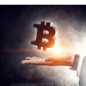 Male hand out of laptop screen presenting bitcoin concept. 3D rendering