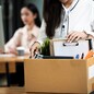 Resign From Job Or Fired Employee Moving Out Of Office, Frustrated Fired Asian Employee Woman Packing Belongings In Cardboard Box