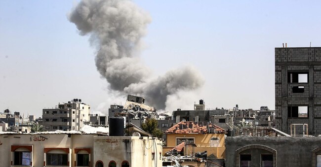Smoke billows on the horizon east of the Bureij camp for Palestinian refugees in the central Gaza Strip following Israeli bombardment on April 2, 2025. (Photo by Eyad BABA / AFP)