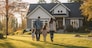 Rear View, Young family looking at their new home standing, real estate purchase, Generative AI