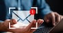 Businessman sending email by laptop computer to customer, business contact and communication, email icon, email marketing concept, send e-mail or newsletter, online working internet network.