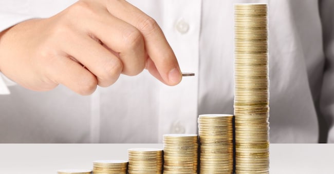 Hand put coin to money ,Business idea