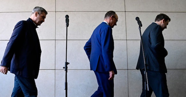 Da sinistra: Markus Soeder (leader della Csu), Friedrich Merz (Cdu) e Lars Klingbeil (Spd), prossimi partner di Governo a Berlino (AFP)