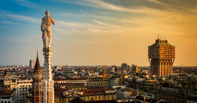 Skyline of Milan, Italy at sunset. View from the Roof Terrance of Duomo Di Milano.