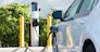 An electric car charging in California