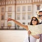 Happy tourist sightseeing city with map