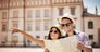 Happy tourist sightseeing city with map
