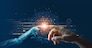AI, Machine learning, Hands of robot and human touching on big data network connection background, Science and artificial intelligence technology, innovation and futuristic.
