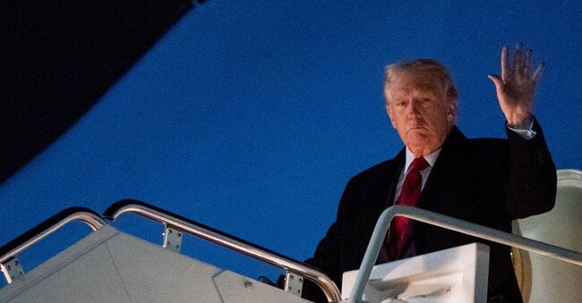 U.S. President Donald Trump exits Air Force One as he arrives at Joint Base Andrews in Maryland, U.S. April 13, 2025. REUTERS/Nathan Howard