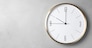 Modern clock on grey background, top view. Time management