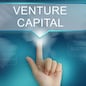 hand pushing on venture capital balloon text button